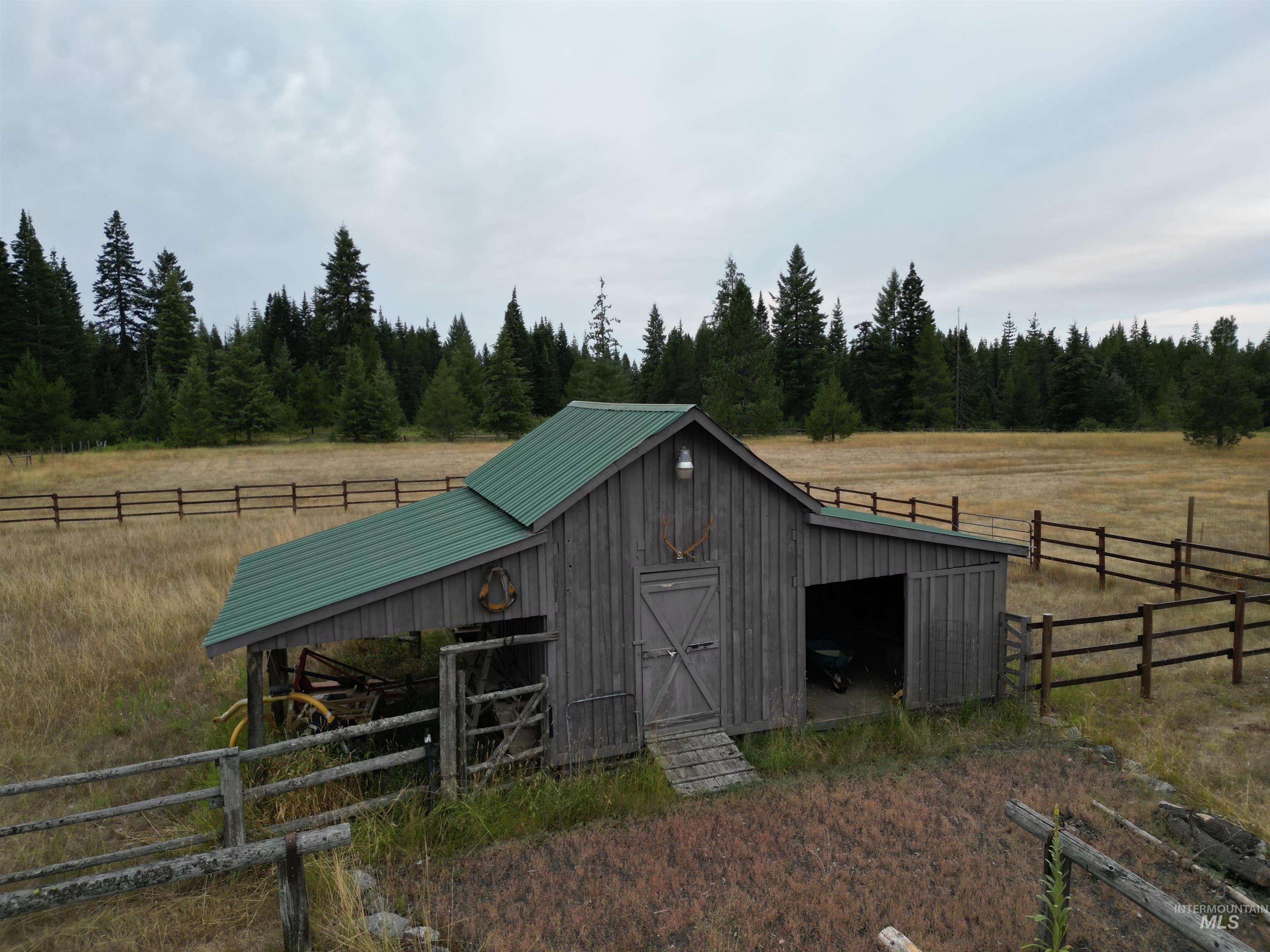 232 Lackey Road Weippe, ID 83553 - Photo 22 of 33 View of outbuilding featuring a view of rural / pastoral area and a view of trees