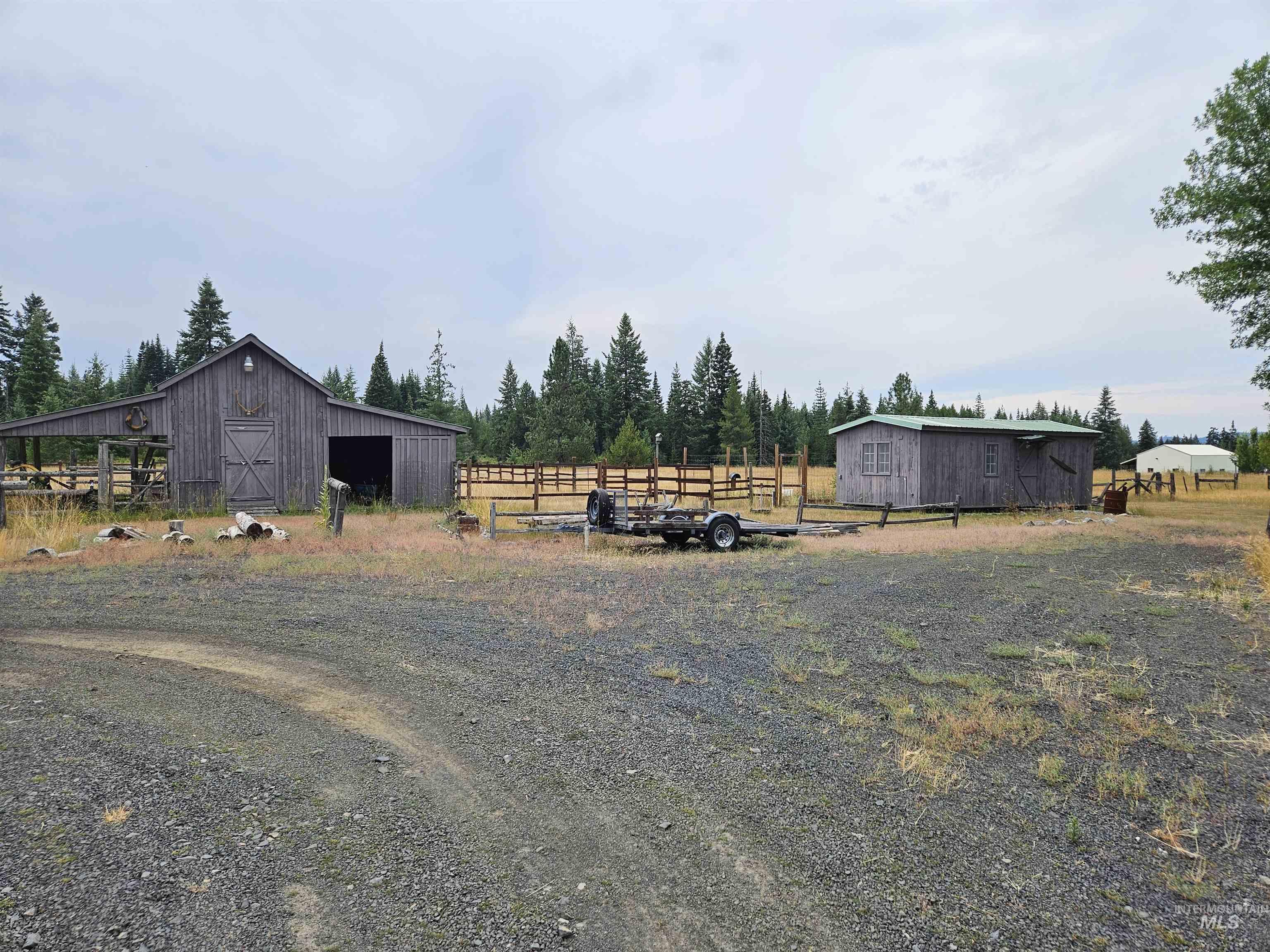 232 Lackey Road Weippe, ID 83553 - Photo 26 of 33 View of yard with an outbuilding