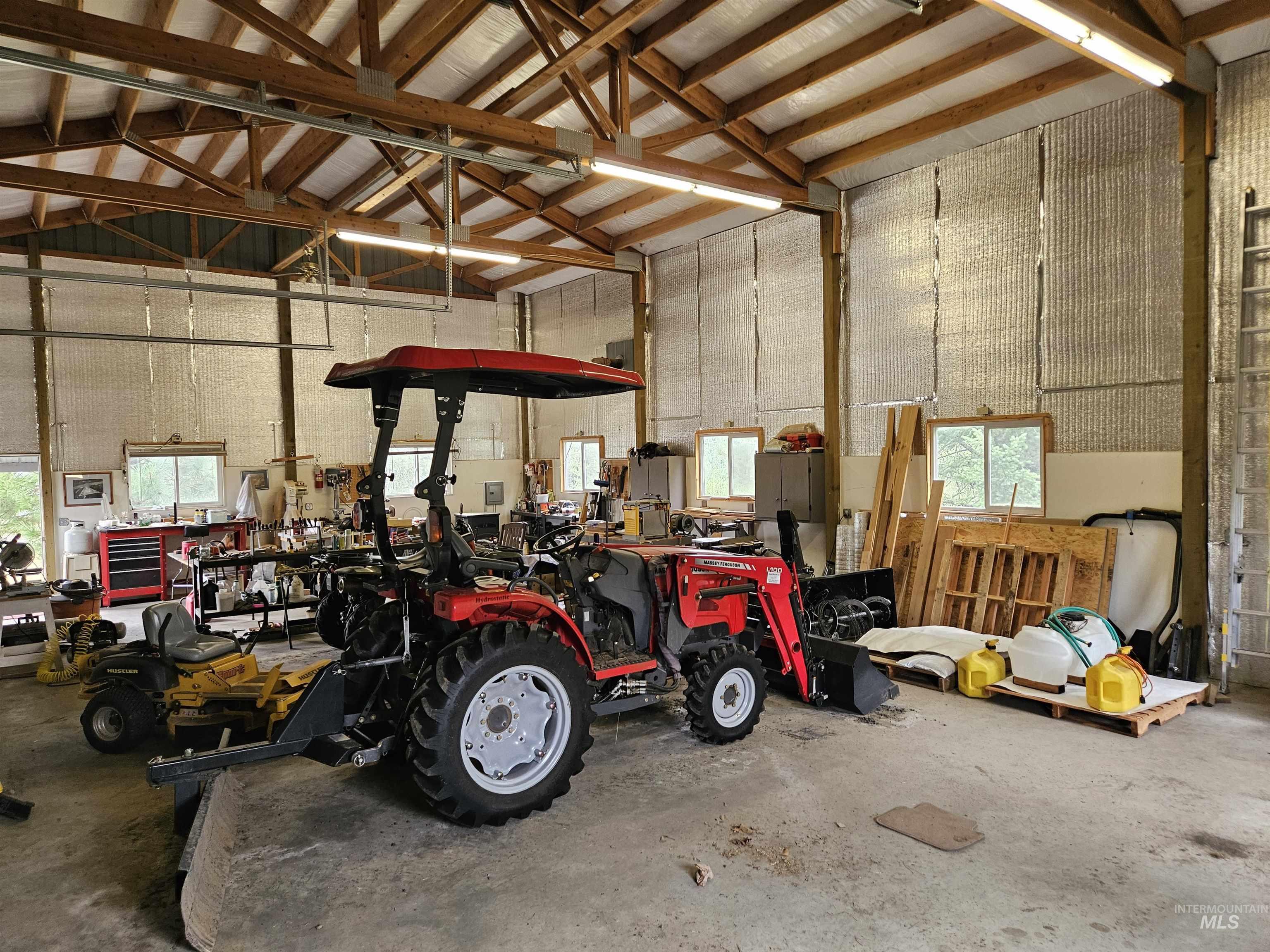 232 Lackey Road Weippe, ID 83553 - Photo 29 of 33 Garage featuring a workshop area