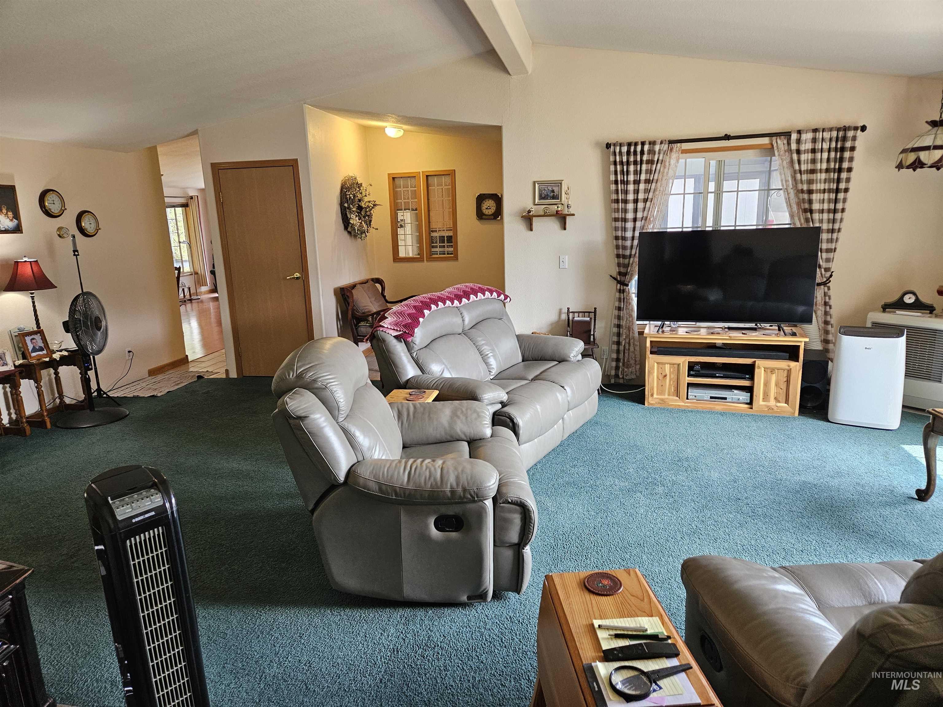 232 Lackey Road Weippe, ID 83553 - Photo 7 of 33 Living area featuring carpet floors