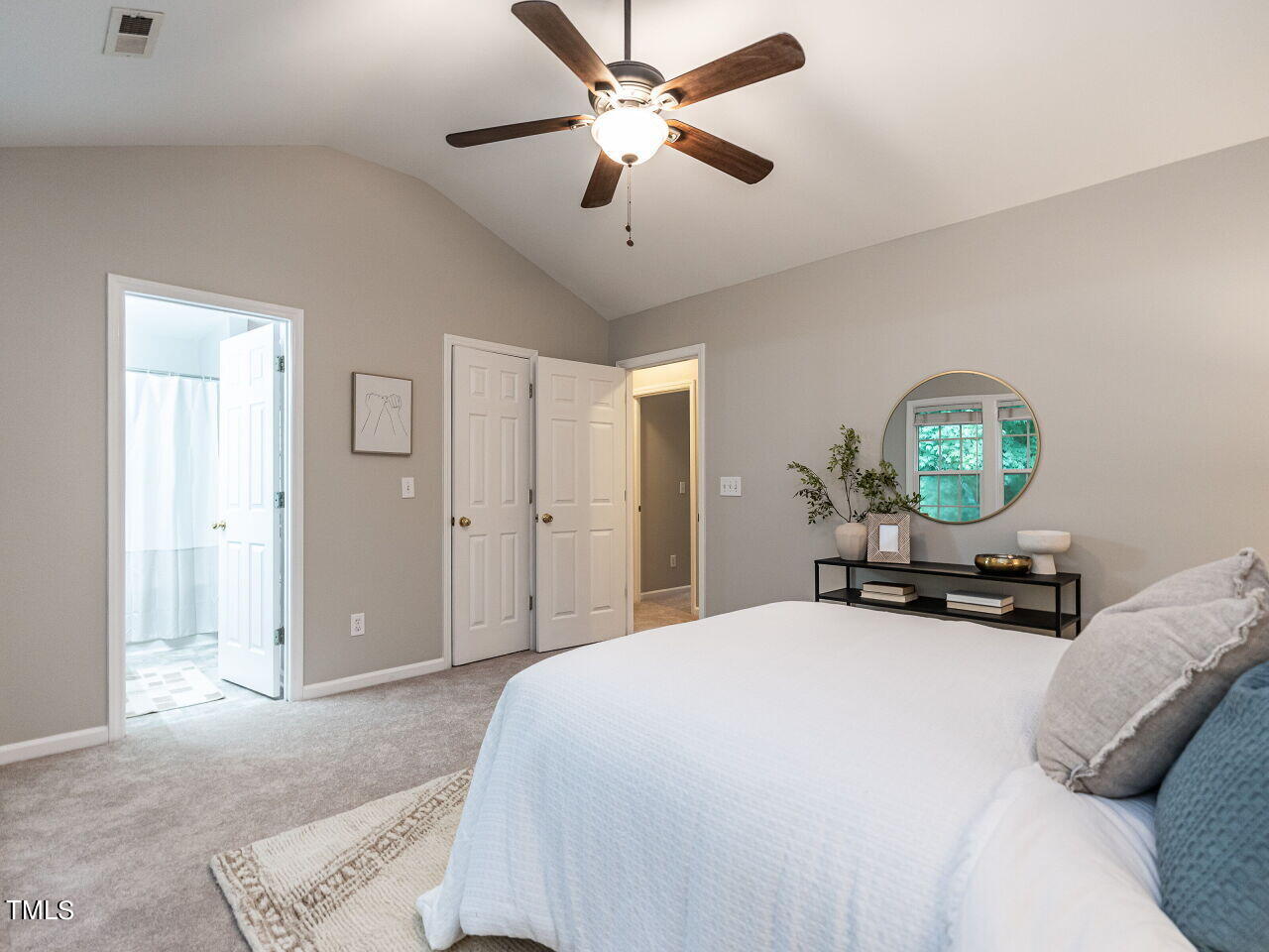 3 Madeira Court Durham, NC 27713 - Photo 16 of 27 a bedroom with a bed window and a chandelier