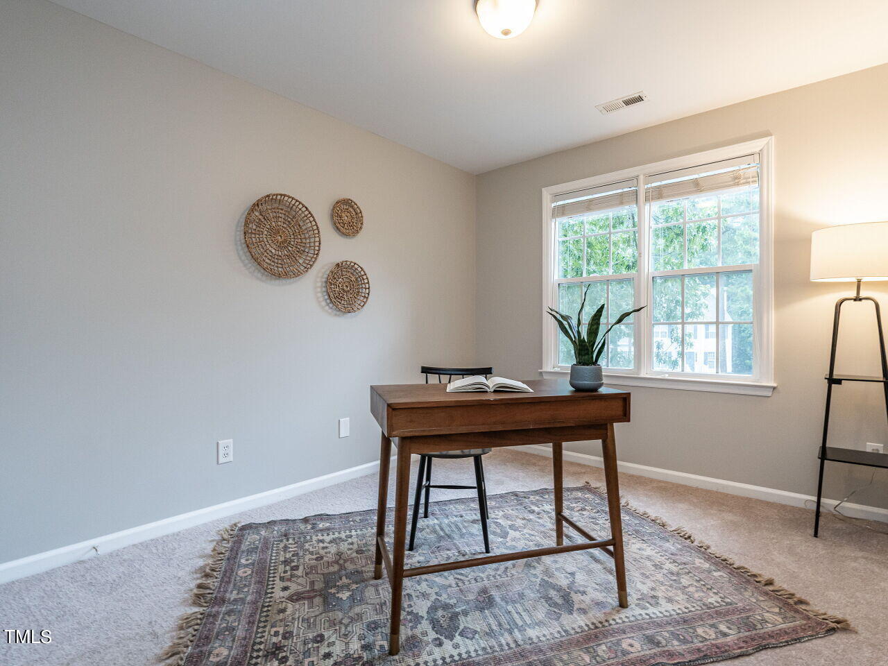 3 Madeira Court Durham, NC 27713 - Photo 19 of 27 a view of a workspace with furniture and a window