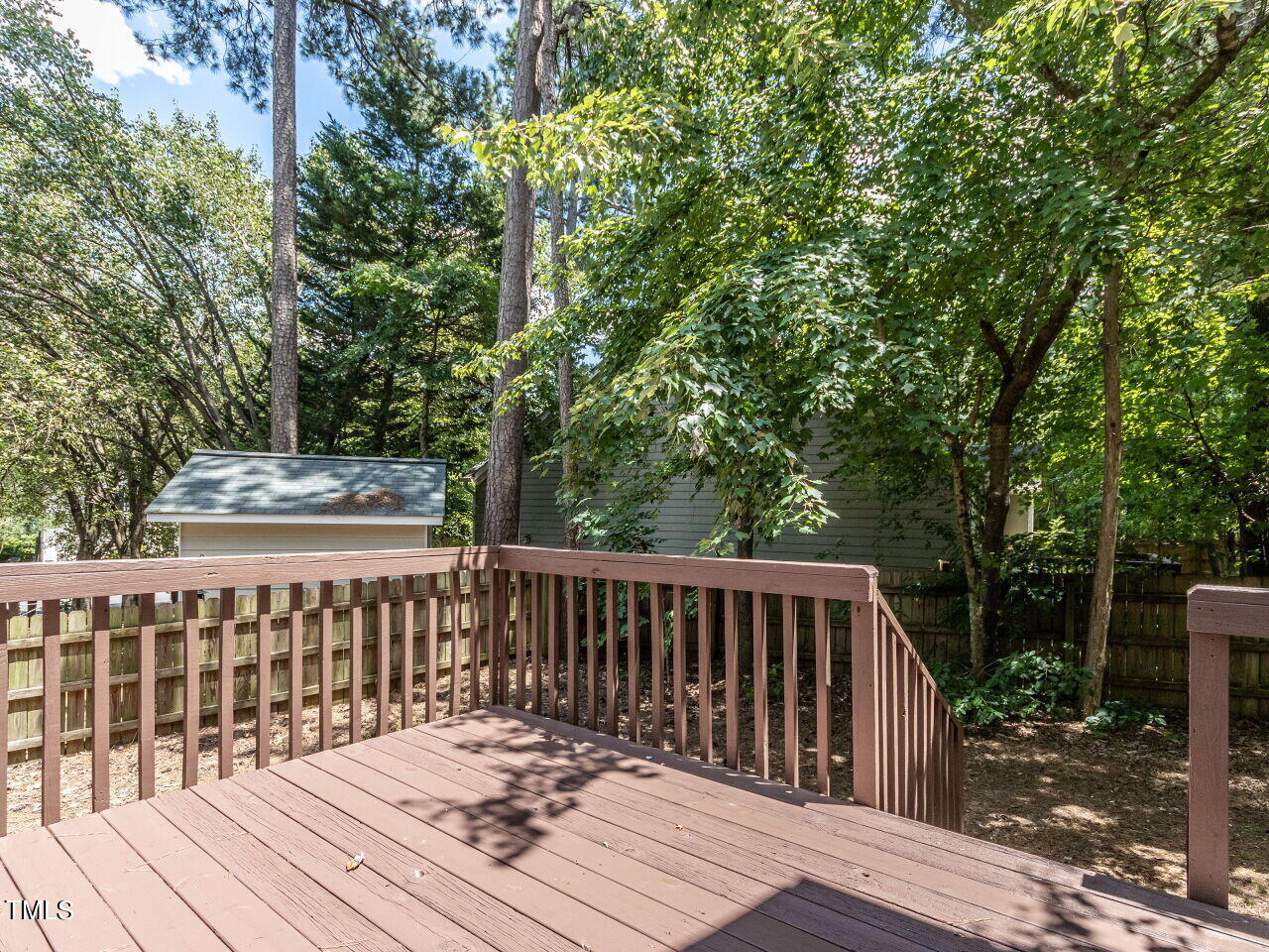 3 Madeira Court Durham, NC 27713 - Photo 23 of 27 a view of wooden deck and a backyard