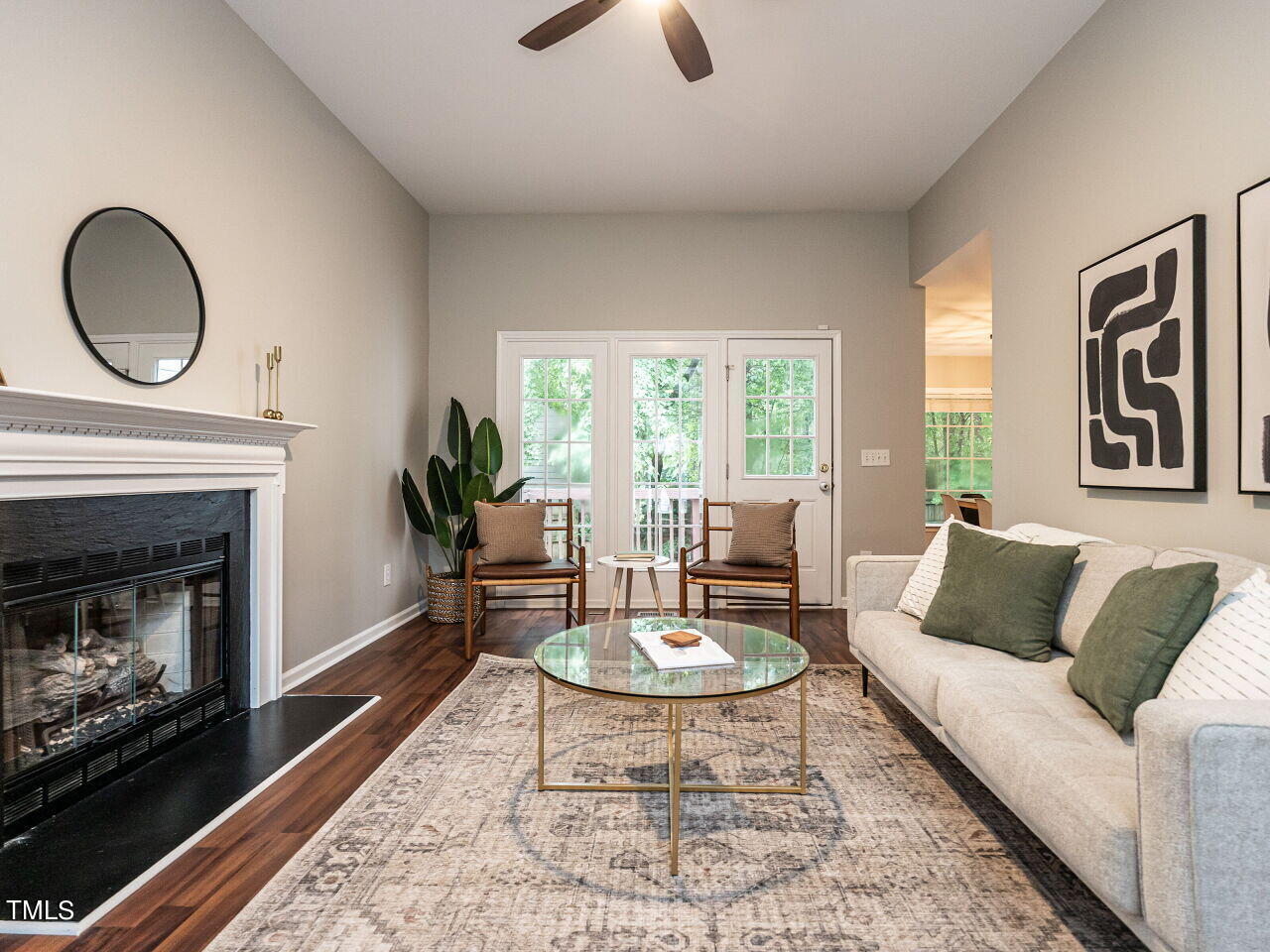 3 Madeira Court Durham, NC 27713 - Photo 6 of 27 a living room with furniture and a fireplace