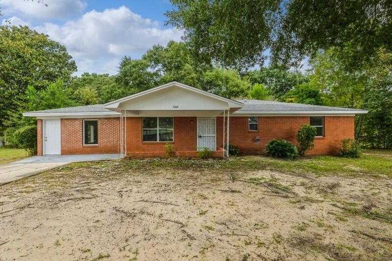 3369 Auburn Road Crestview, FL 32539 - Photo 1 of 33 front view of a house with a yard
