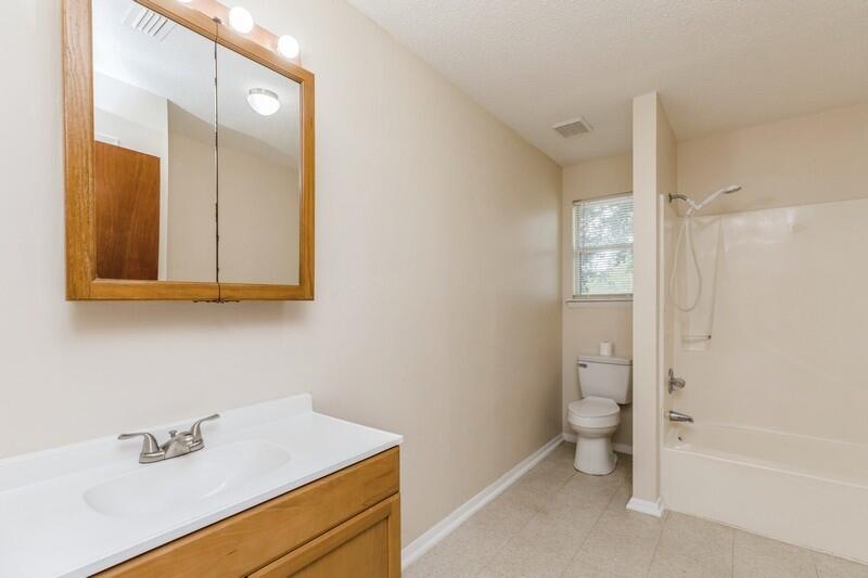 3369 Auburn Road Crestview, FL 32539 - Photo 20 of 33 a bathroom with a sink a toilet and shower