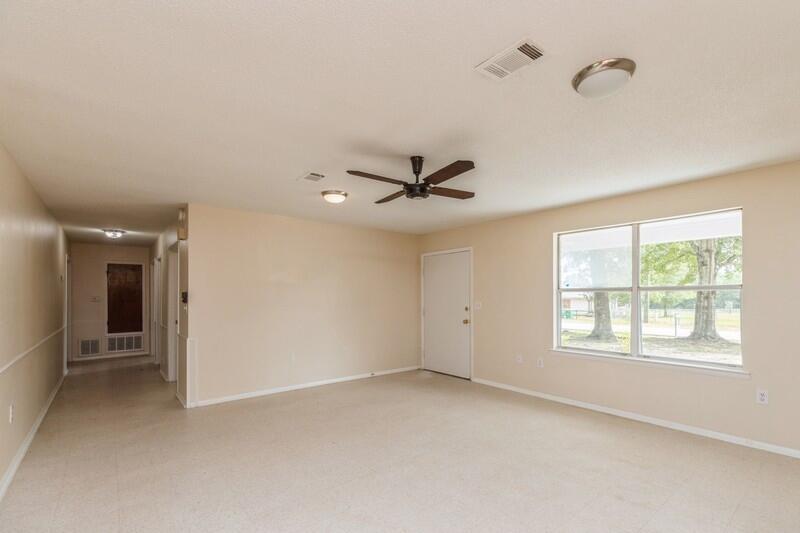 3369 Auburn Road Crestview, FL 32539 - Photo 9 of 33 a view of an empty room with a window
