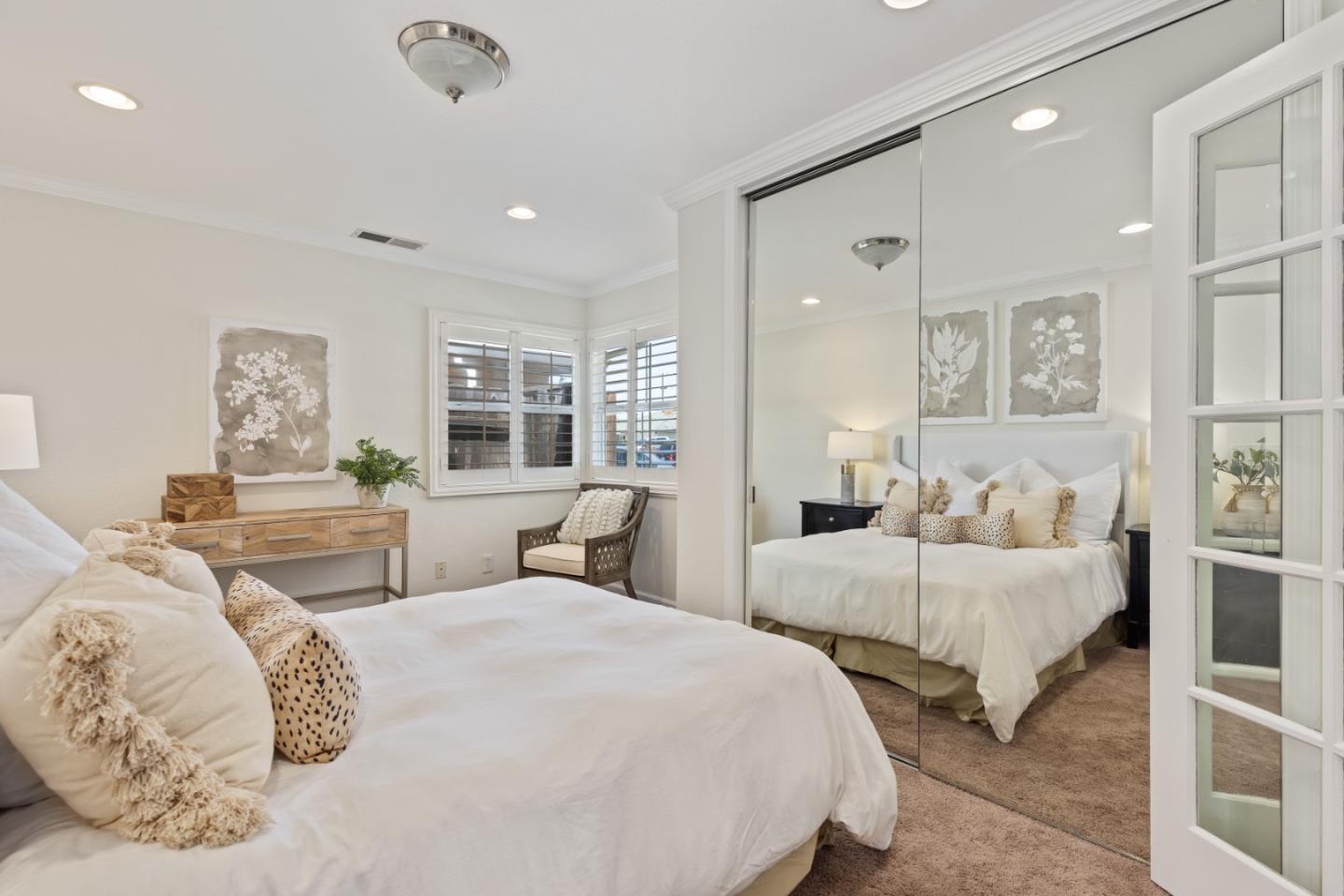 23131 Nevada Road Hayward, CA 94541 - Photo 11 of 28 a bedroom with two beds and a large mirror