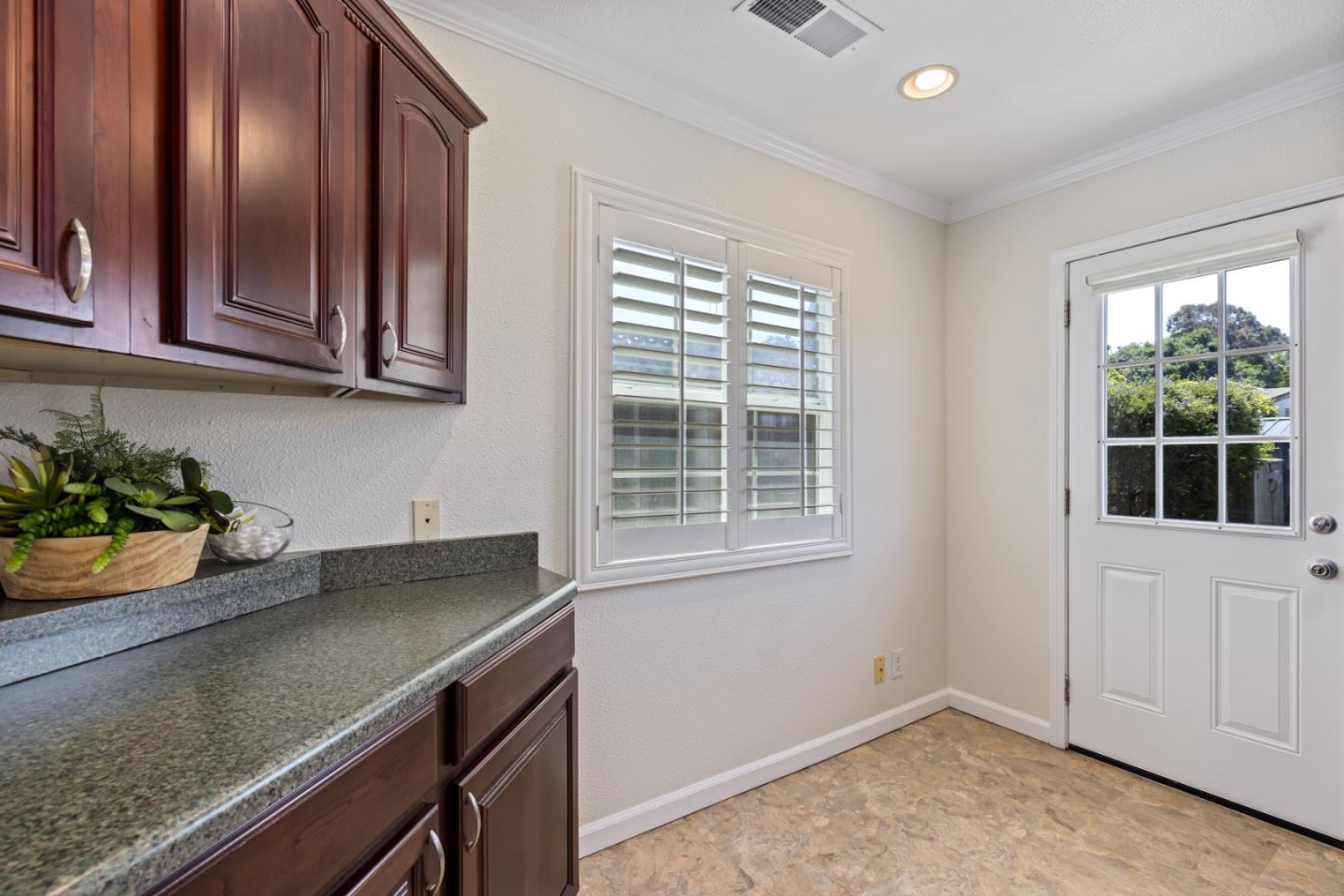 23131 Nevada Road Hayward, CA 94541 - Photo 19 of 28 a kitchen with a sink cabinets and window