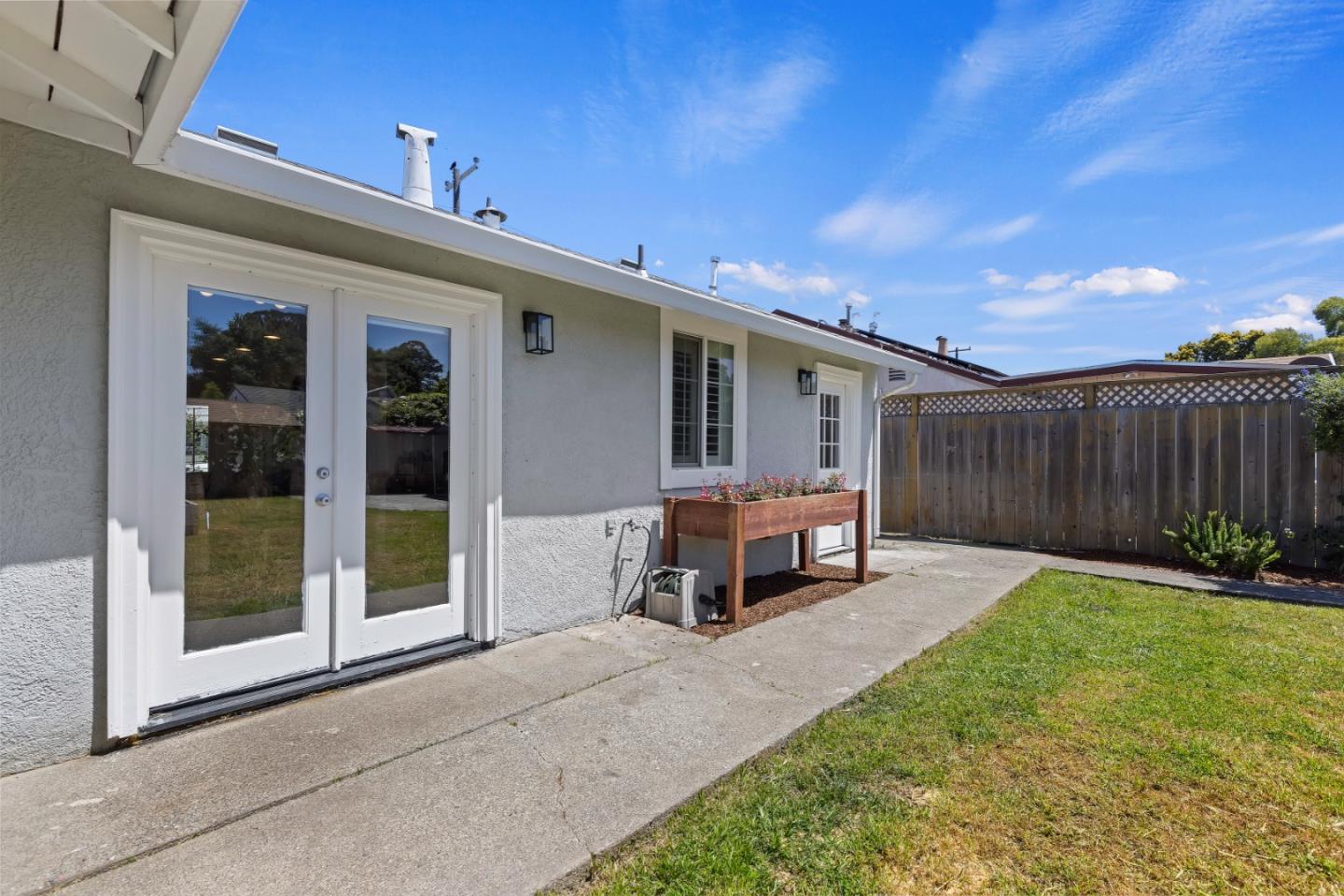 23131 Nevada Road Hayward, CA 94541 - Photo 27 of 28 a view of a house with backyard and sitting area