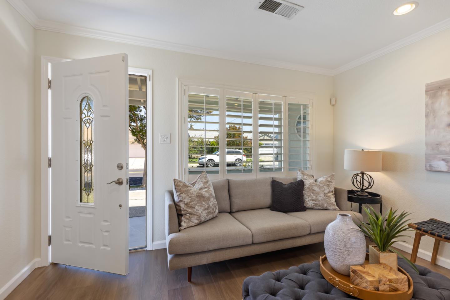 23131 Nevada Road Hayward, CA 94541 - Photo 5 of 28 a living room with furniture and a large window