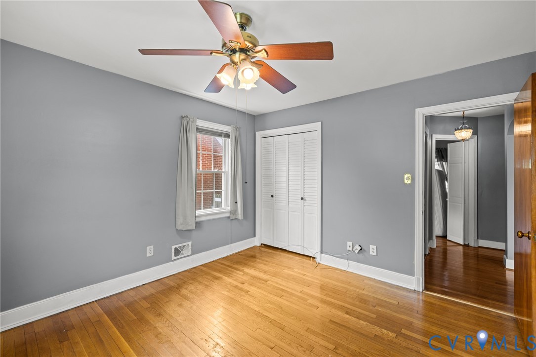 2405 Dumbarton Road Henrico, VA 23228 - Photo 13 of 34 Hardwood flooring, painted walls, ceiling fan with
