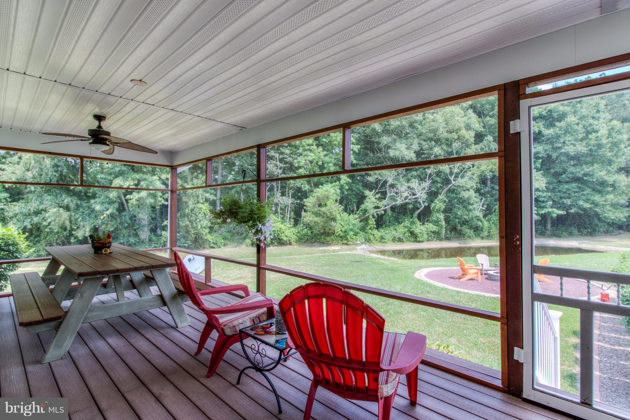 30865 Chesterville Bridge Road Millington, MD 21651 - Photo 27 of 30 Huge screened porch overlooking pond