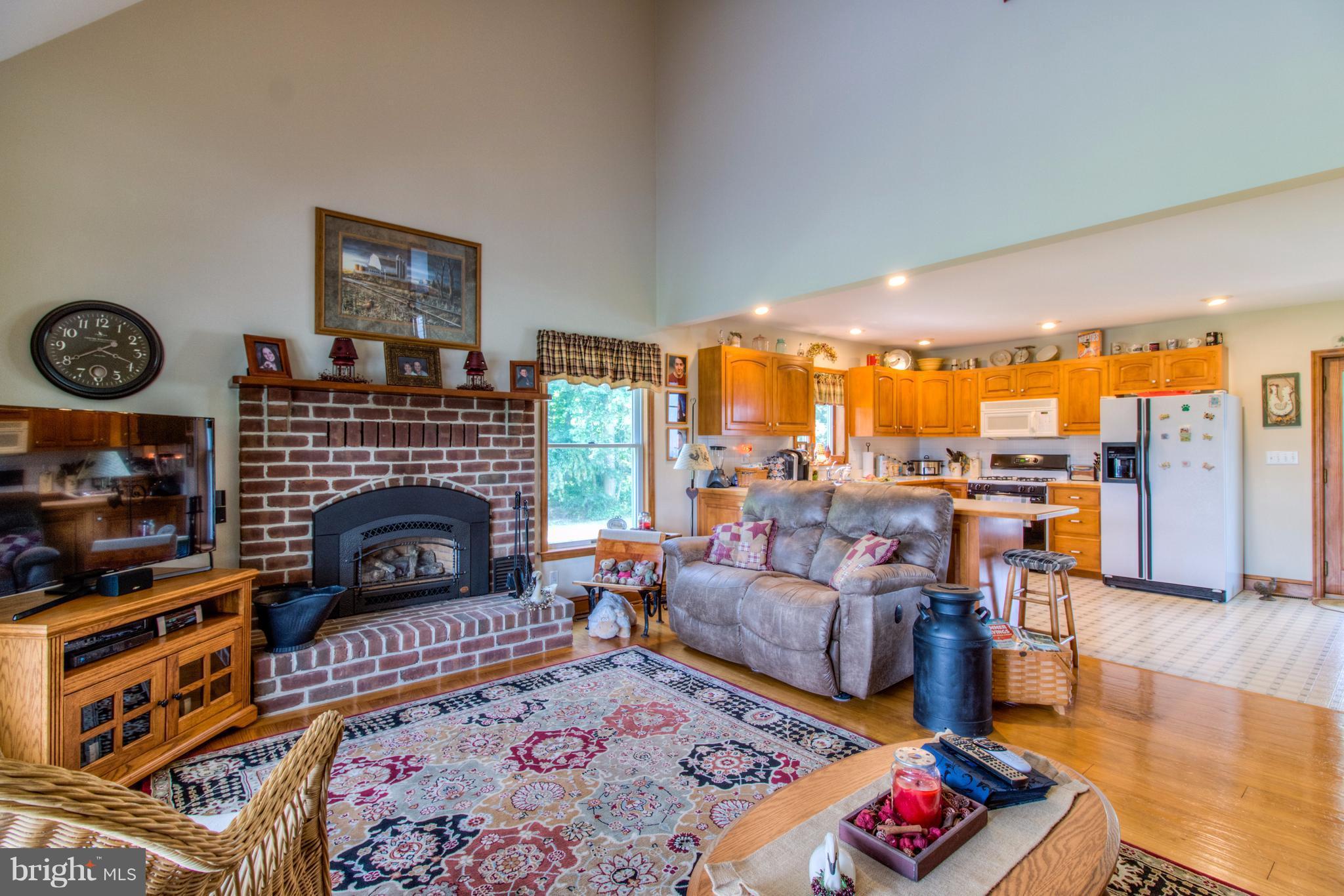 30865 Chesterville Bridge Road Millington, MD 21651 - Photo 8 of 30 Great Room with hardwood floors soaring ceiling w