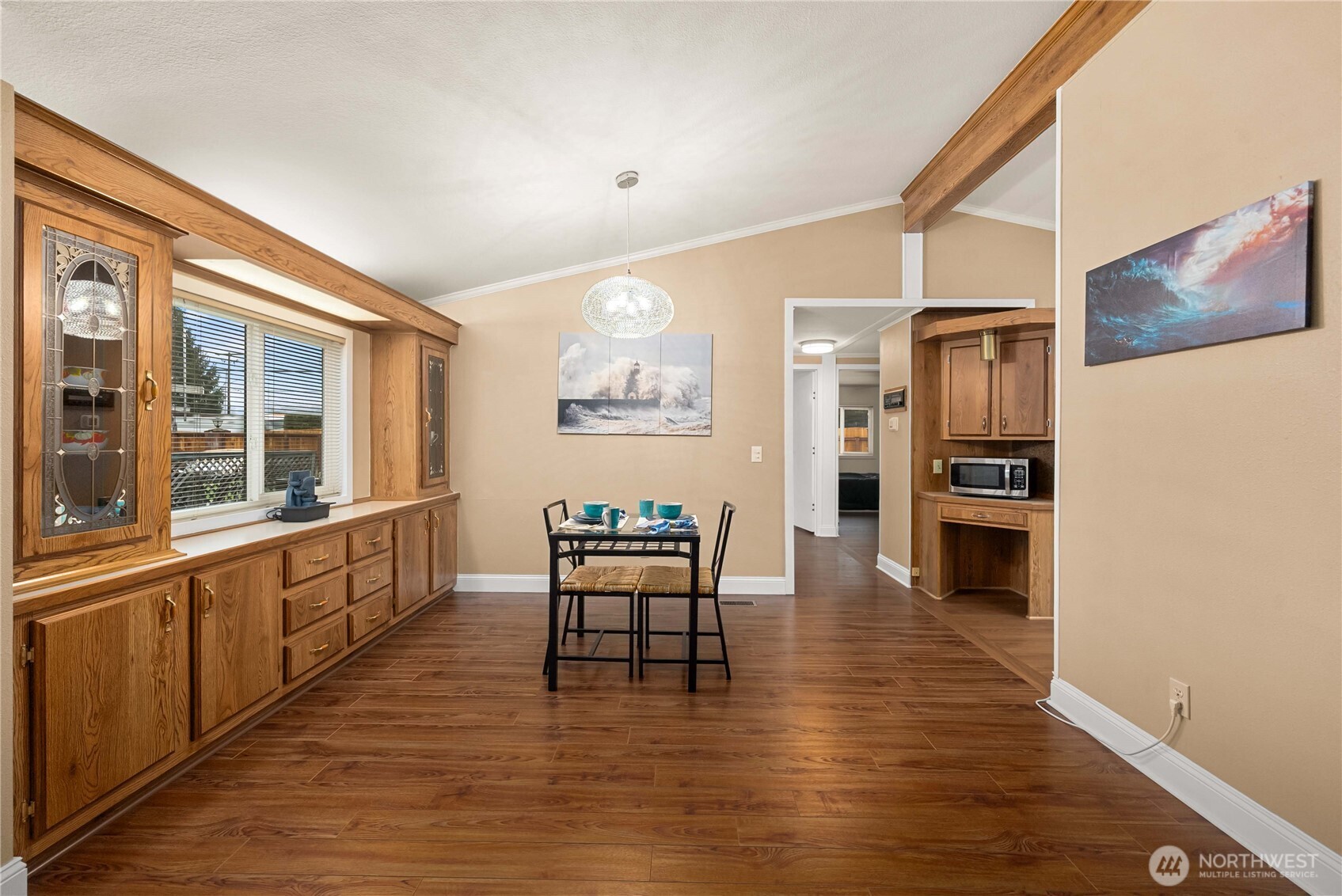 836 Harman Way South, Unit 62 Orting, WA 98360 - Photo 15 of 40 a view of kitchen with furniture and wooden floor
