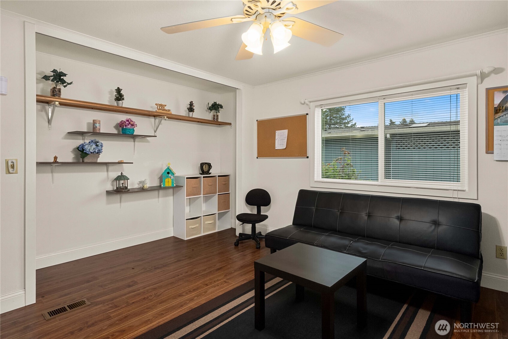 836 Harman Way South, Unit 62 Orting, WA 98360 - Photo 20 of 40 a living room with furniture and a window