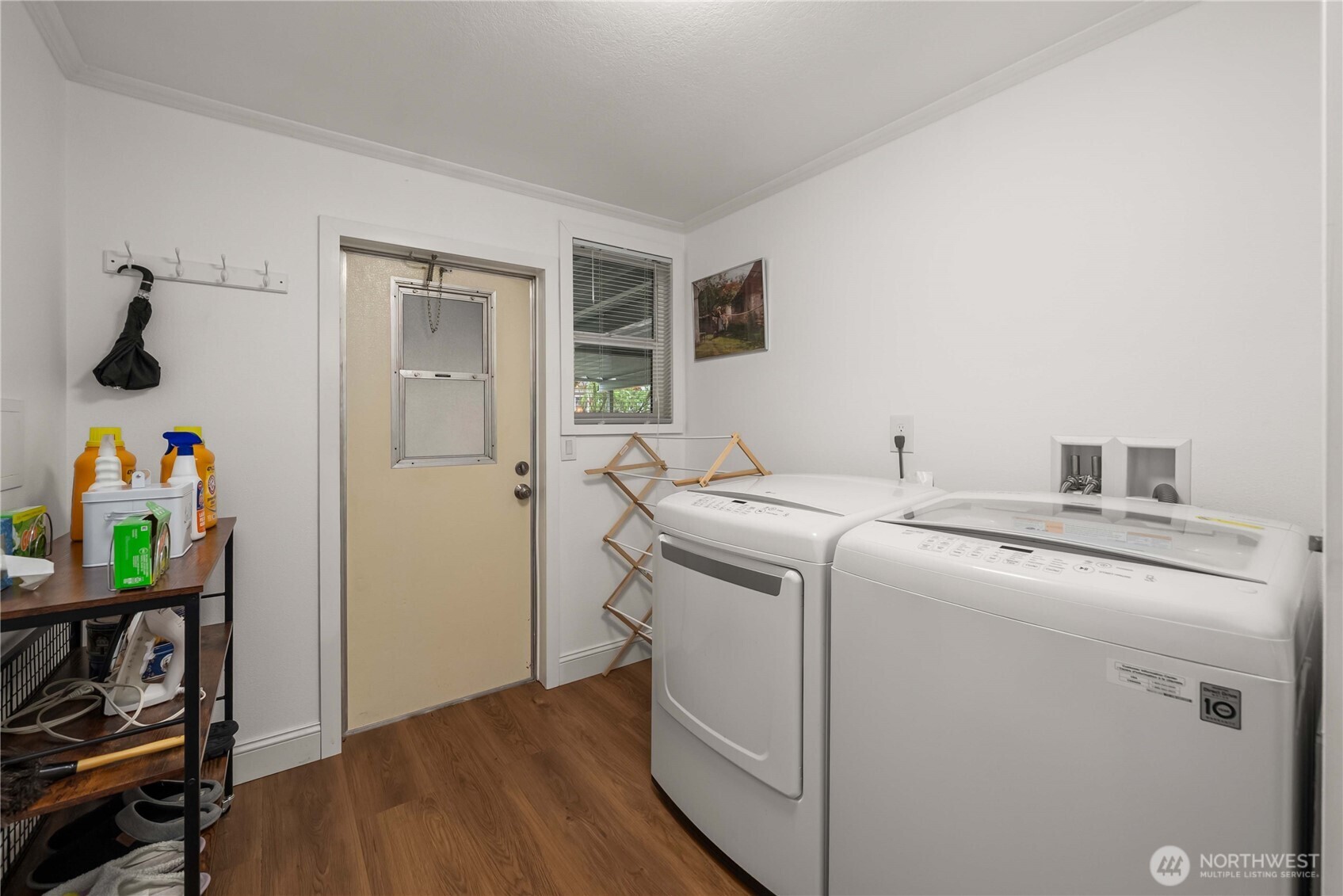 836 Harman Way South, Unit 62 Orting, WA 98360 - Photo 23 of 40 a utility room with dryer and washer