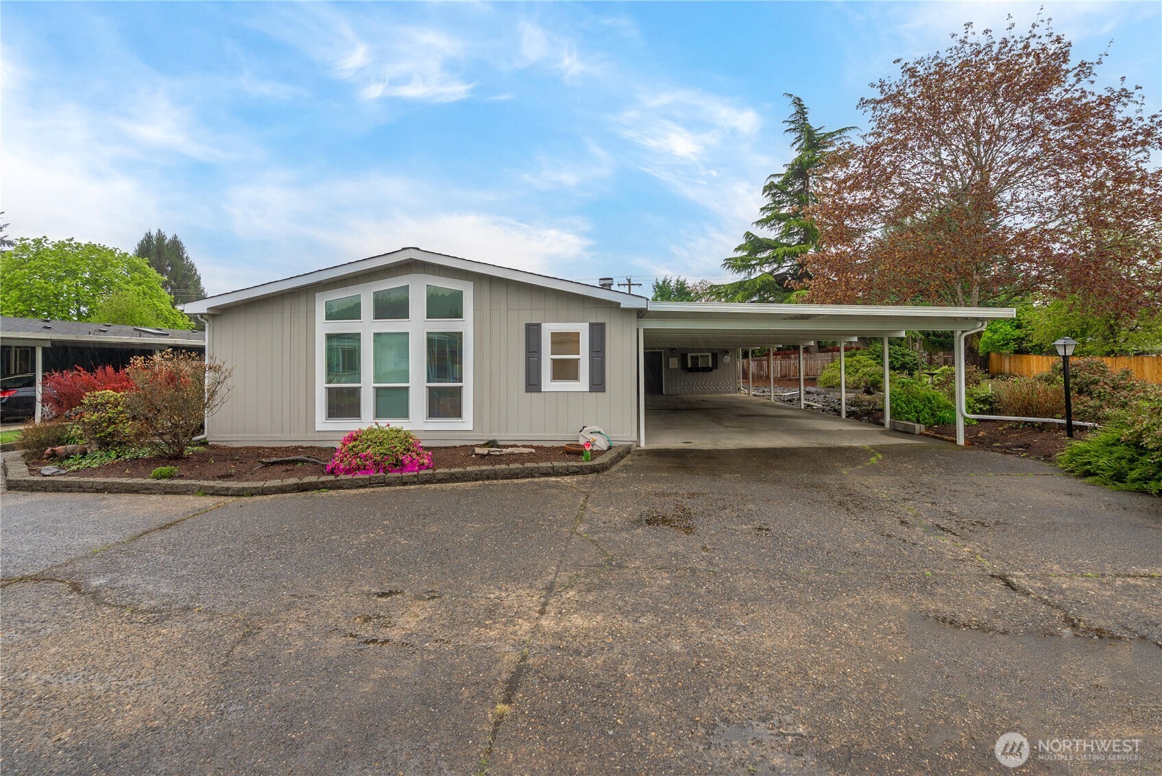 836 Harman Way South, Unit 62 Orting, WA 98360 - Photo 32 of 40 front view of a house with a street