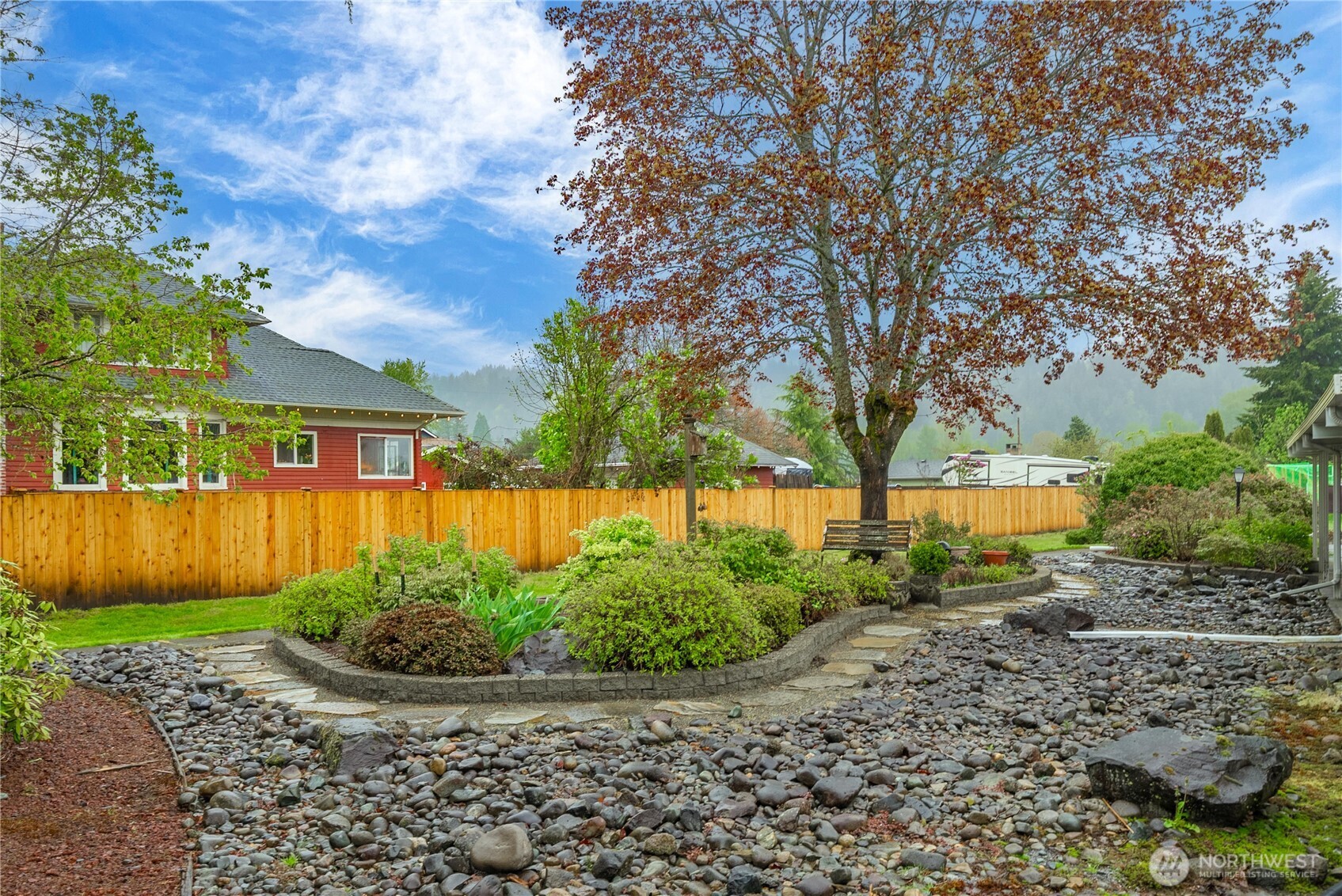 836 Harman Way South, Unit 62 Orting, WA 98360 - Photo 36 of 40 a view of a backyard