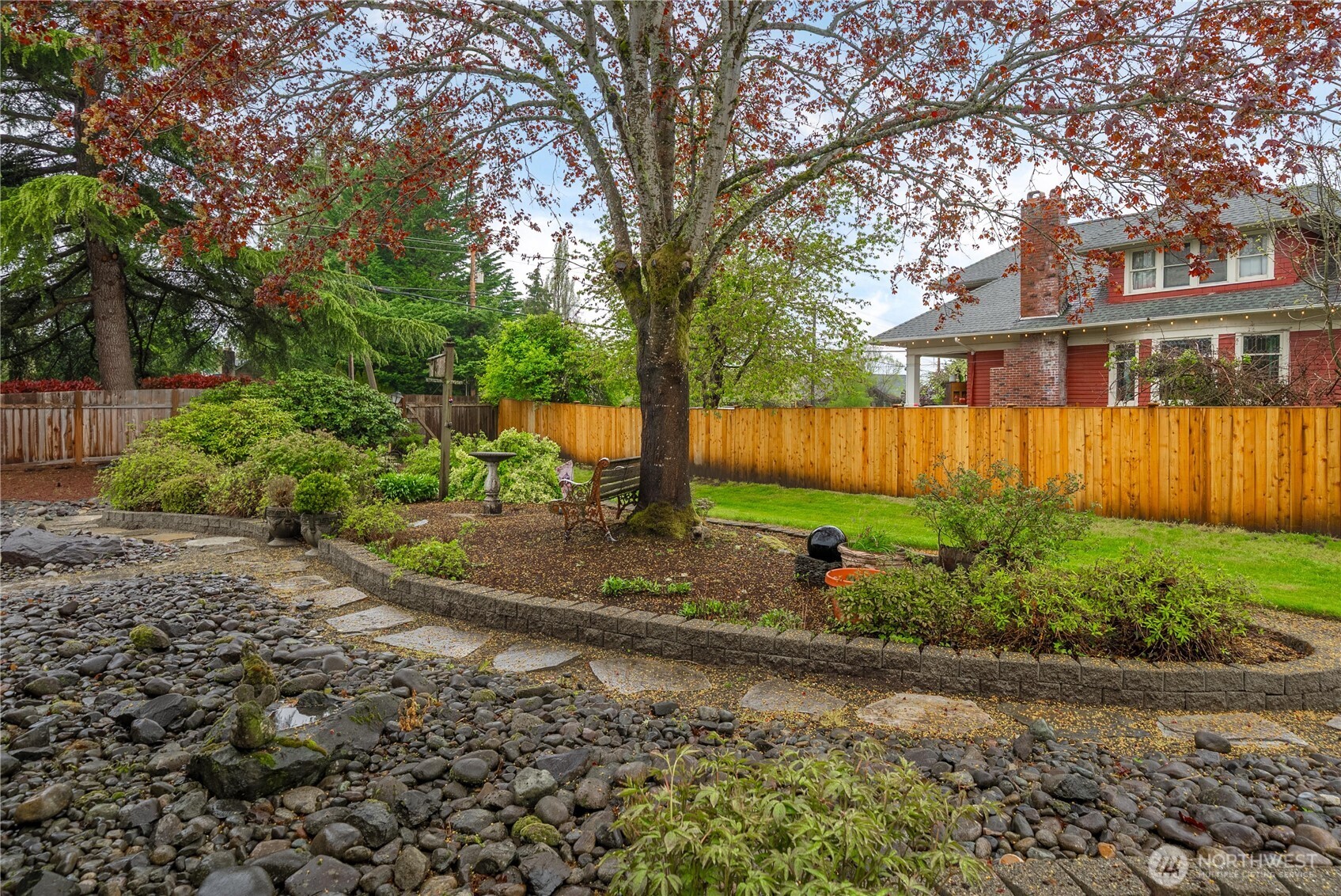 836 Harman Way South, Unit 62 Orting, WA 98360 - Photo 37 of 40 a backyard of a house with lots of green space