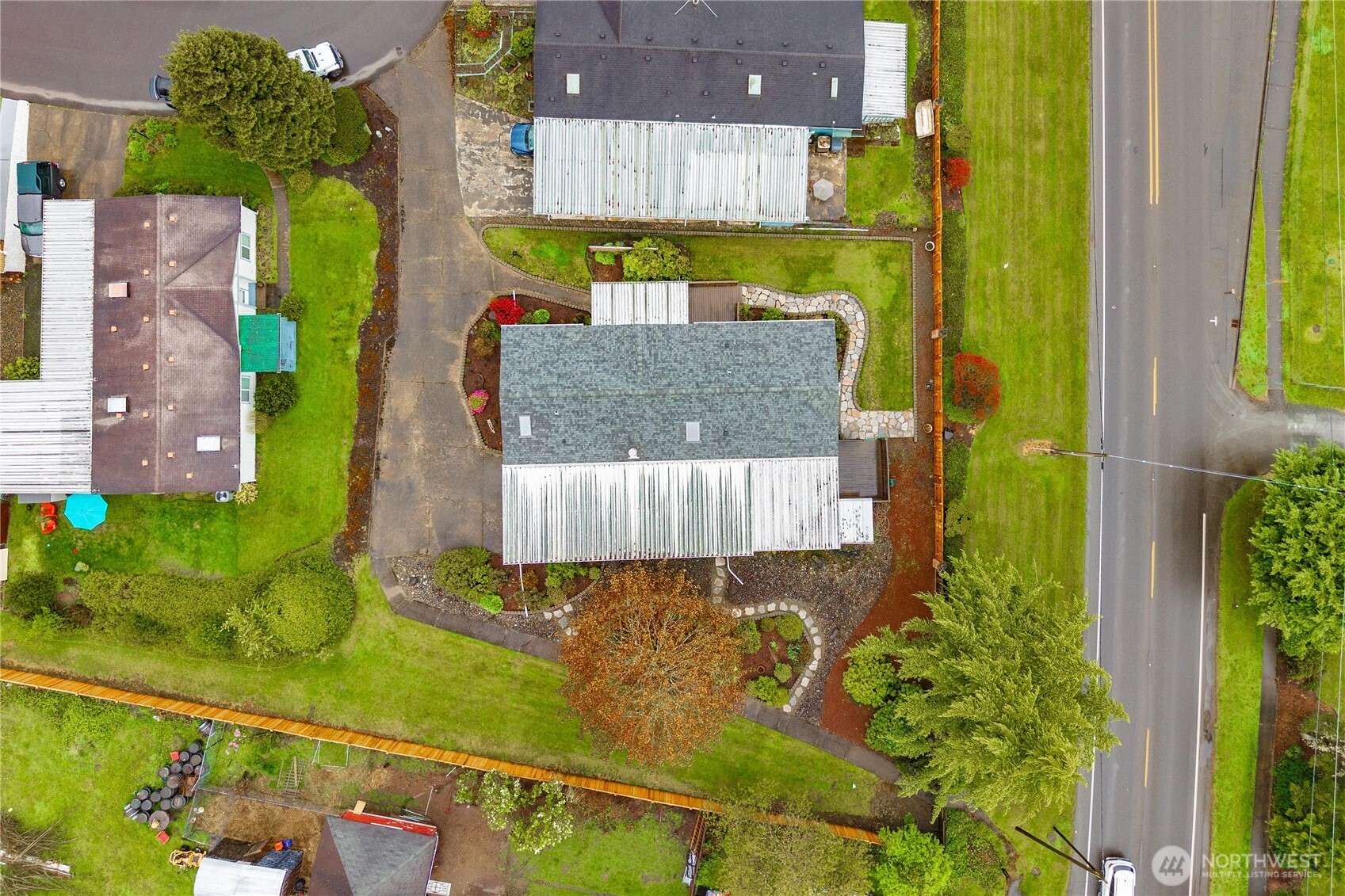 836 Harman Way South, Unit 62 Orting, WA 98360 - Photo 38 of 40 view of a back yard from a balcony