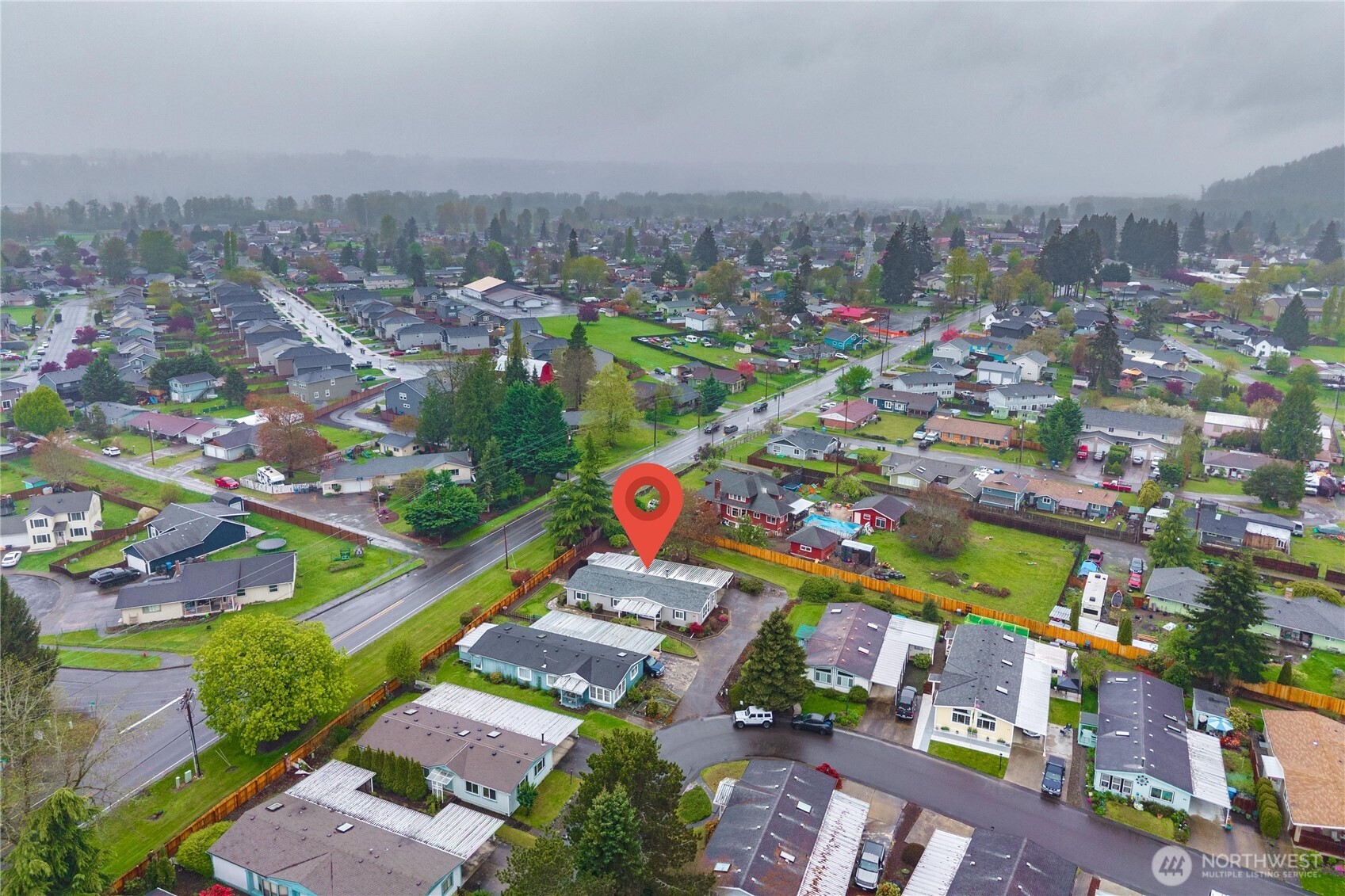 836 Harman Way South, Unit 62 Orting, WA 98360 - Photo 40 of 40 an aerial view of a city