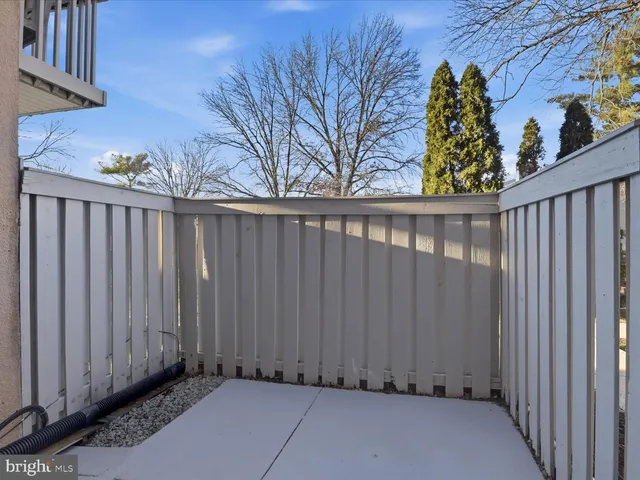 a view of a wooden fence