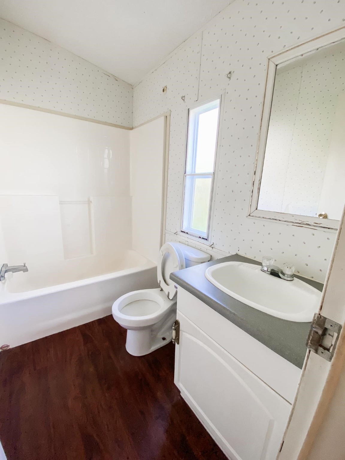 2294 Farm To Market 980, Unit C Huntsville, TX 77320 - Photo 6 of 8 Hall bath has a tub shower combo.