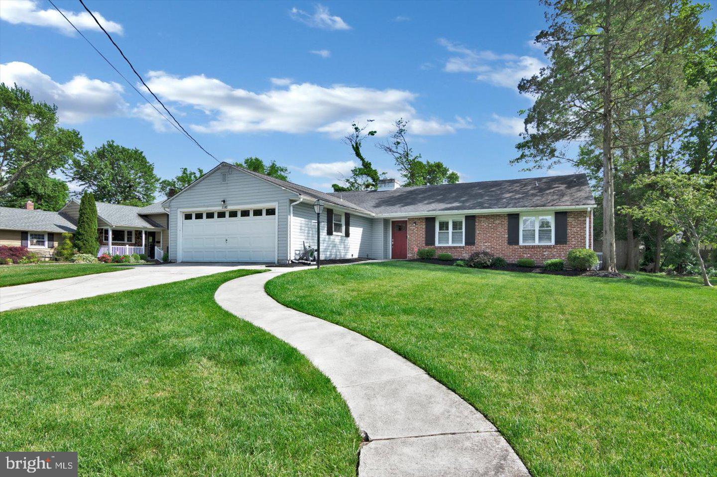 a swimming pool with outdoor seating and yard