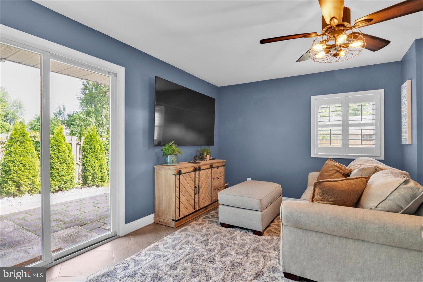 1102 Cooperskill Road Cherry Hill, NJ 08034 - Photo 16 of 38 a living room with furniture and a flat screen tv