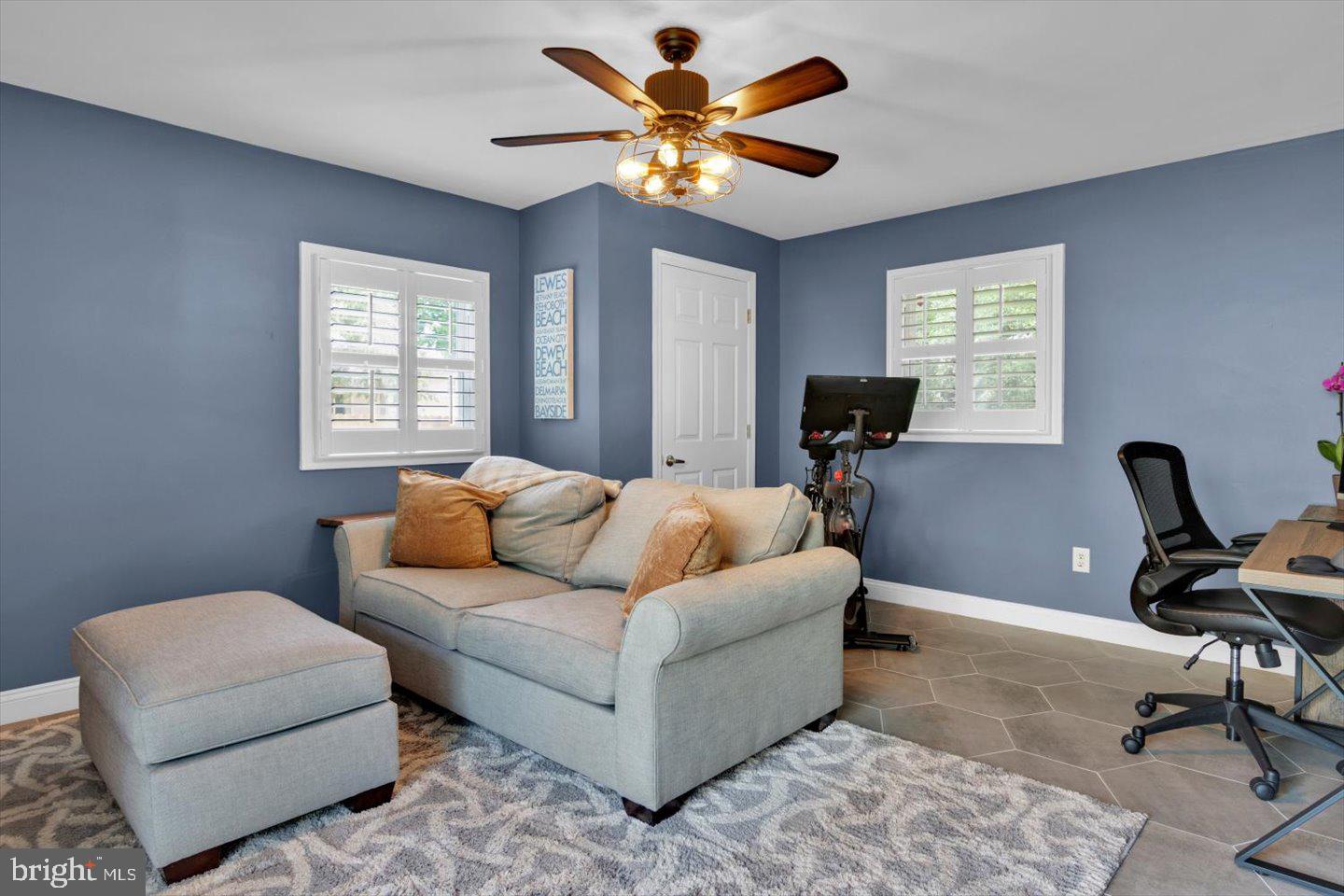 1102 Cooperskill Road Cherry Hill, NJ 08034 - Photo 17 of 38 a living room with furniture ceiling fan and a window