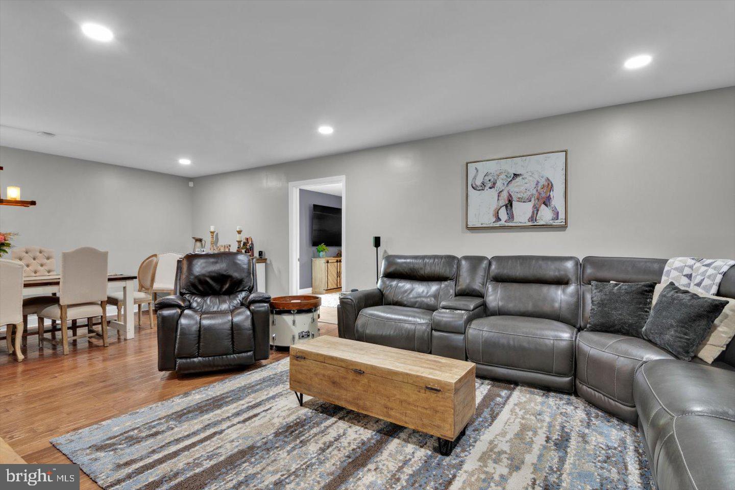 1102 Cooperskill Road Cherry Hill, NJ 08034 - Photo 18 of 38 a living room with furniture kitchen view and a wooden floor