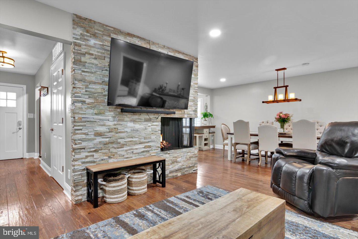 1102 Cooperskill Road Cherry Hill, NJ 08034 - Photo 19 of 38 a living room with furniture and a fireplace