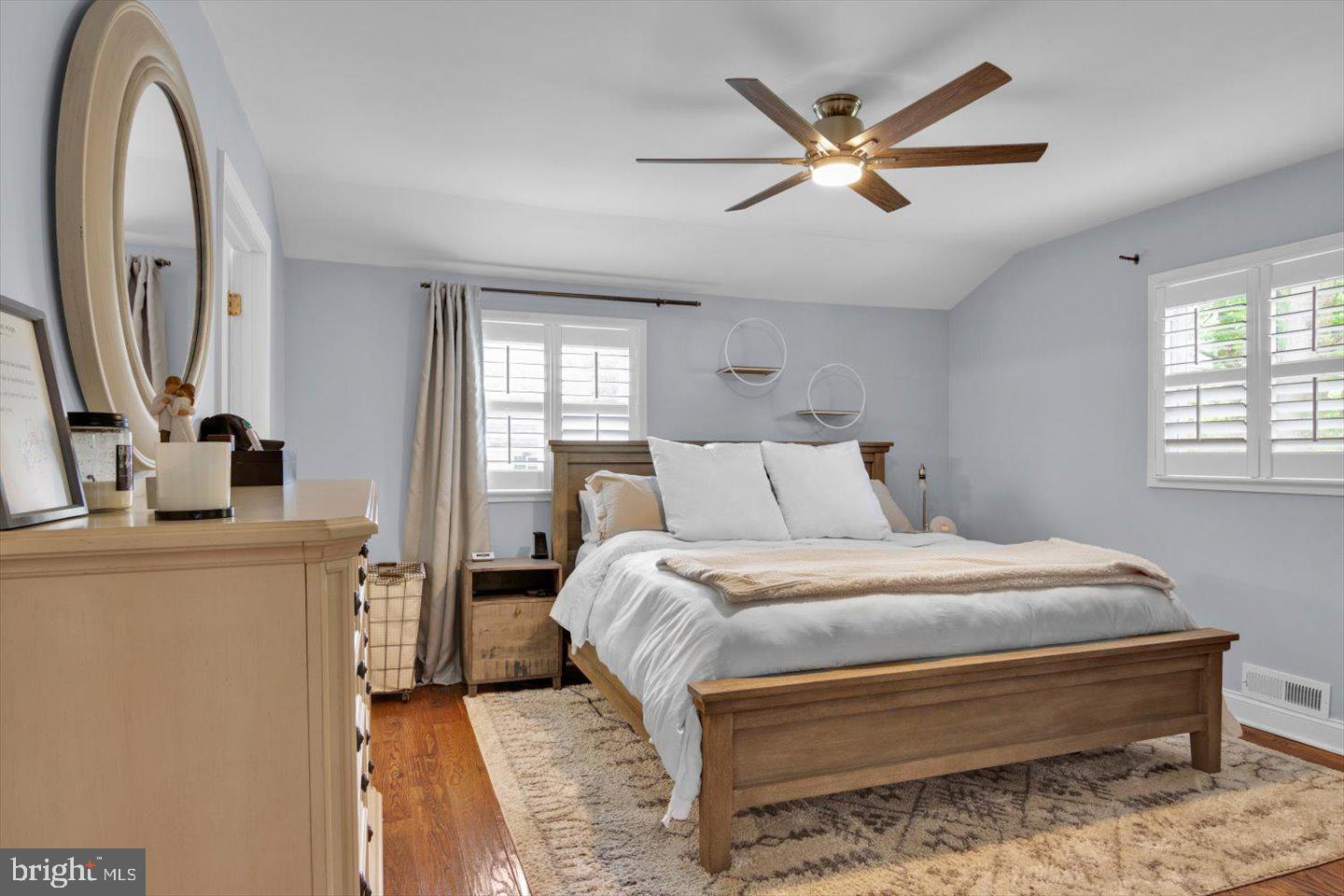 1102 Cooperskill Road Cherry Hill, NJ 08034 - Photo 21 of 38 a bedroom with a large bed and a chandelier