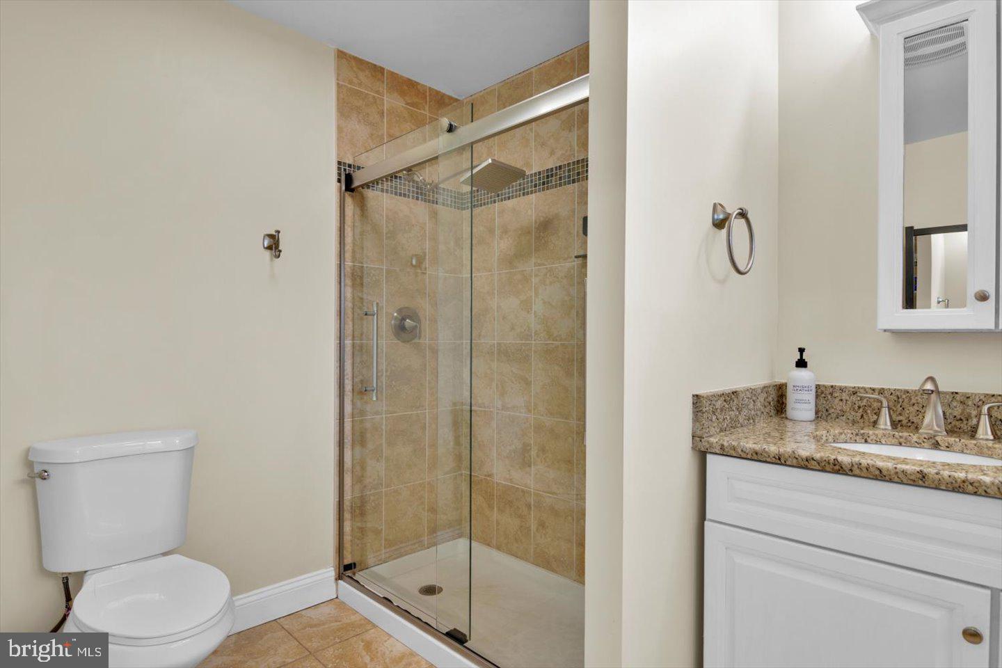 1102 Cooperskill Road Cherry Hill, NJ 08034 - Photo 25 of 38 a bathroom with a granite countertop sink toilet and shower