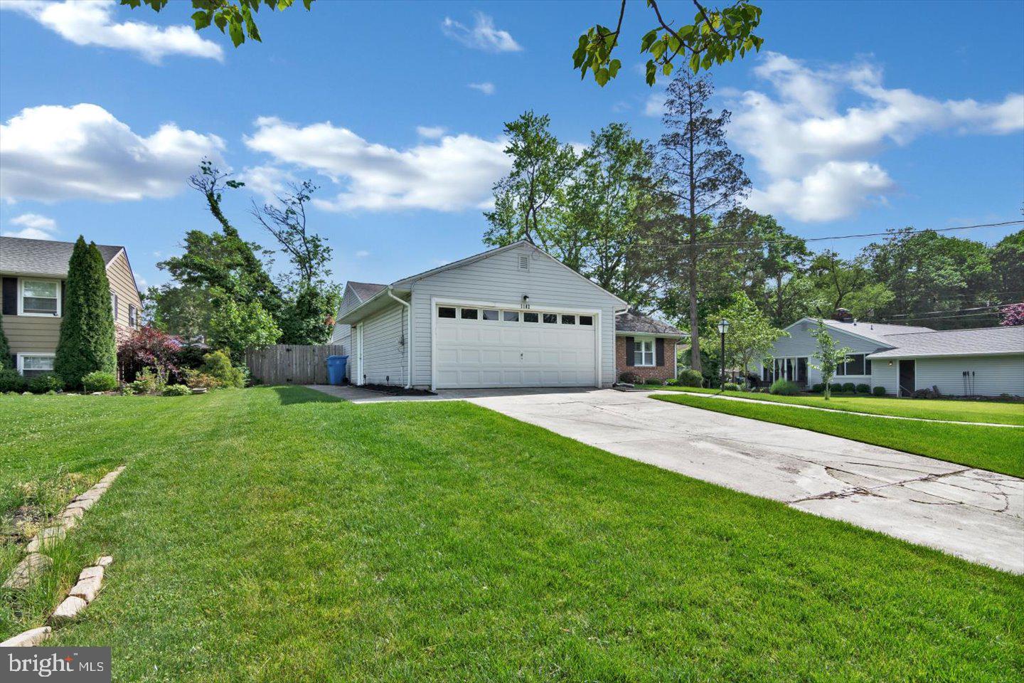 1102 Cooperskill Road Cherry Hill, NJ 08034 - Photo 32 of 38 a front view of a house with garden