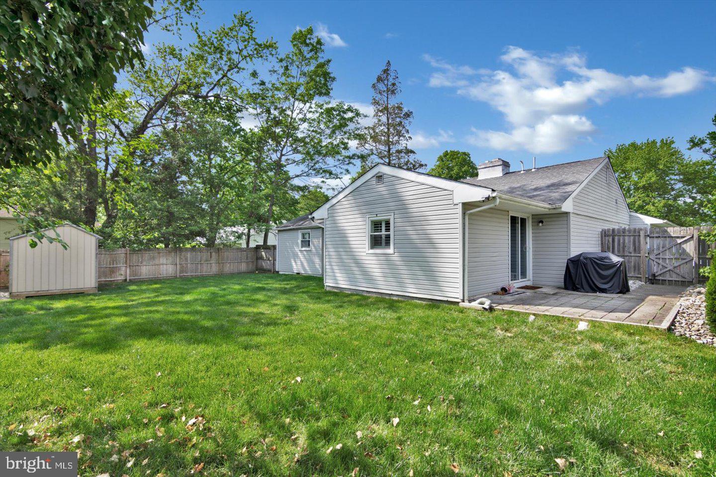 1102 Cooperskill Road Cherry Hill, NJ 08034 - Photo 35 of 38 a view of a house with a yard and sitting area