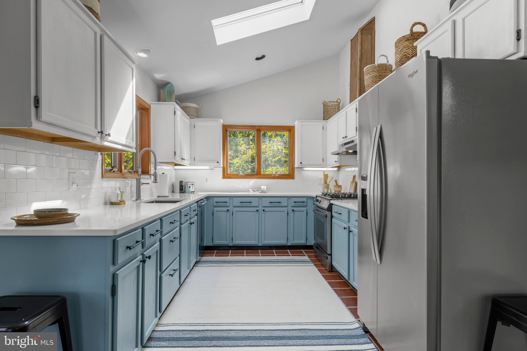 10050 Forrest Lane Chestertown, MD 21620 - Photo 16 of 49 a kitchen with stainless steel appliances a refrigerator sink and cabinets