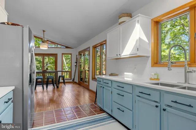 a very nice looking kitchen with a window