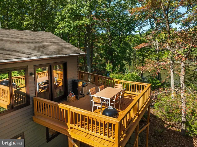 an outdoor sitting area with furniture