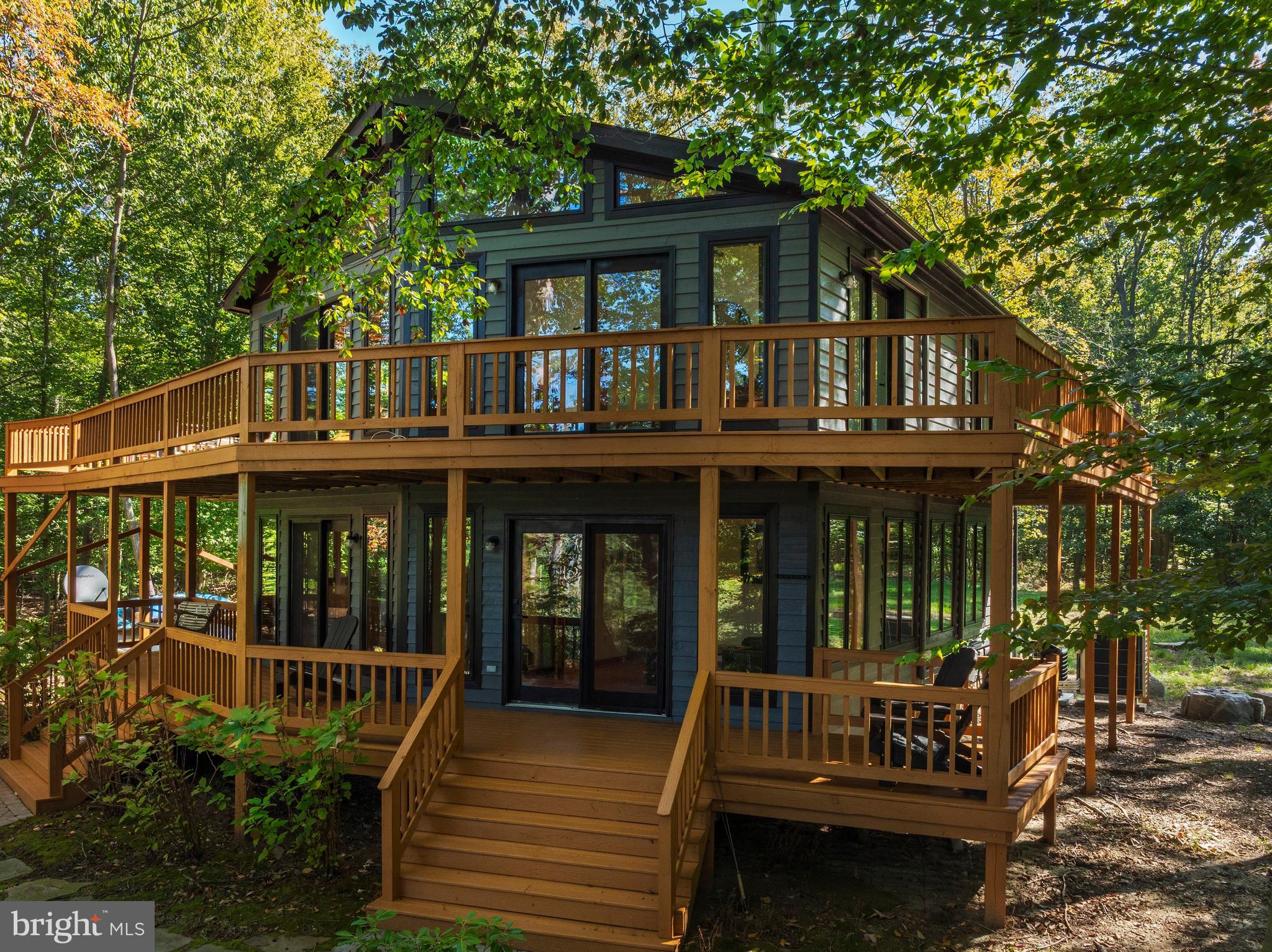 10050 Forrest Lane Chestertown, MD 21620 - Photo 2 of 49 a view of house with a deck and furniture