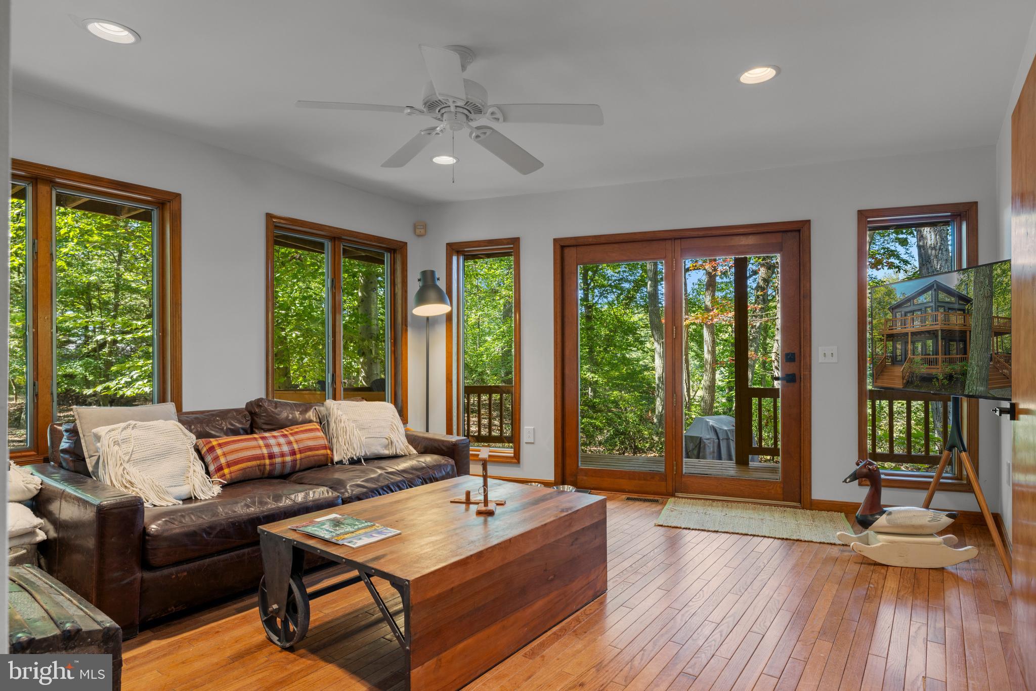 10050 Forrest Lane Chestertown, MD 21620 - Photo 38 of 49 a living room with furniture and large windows