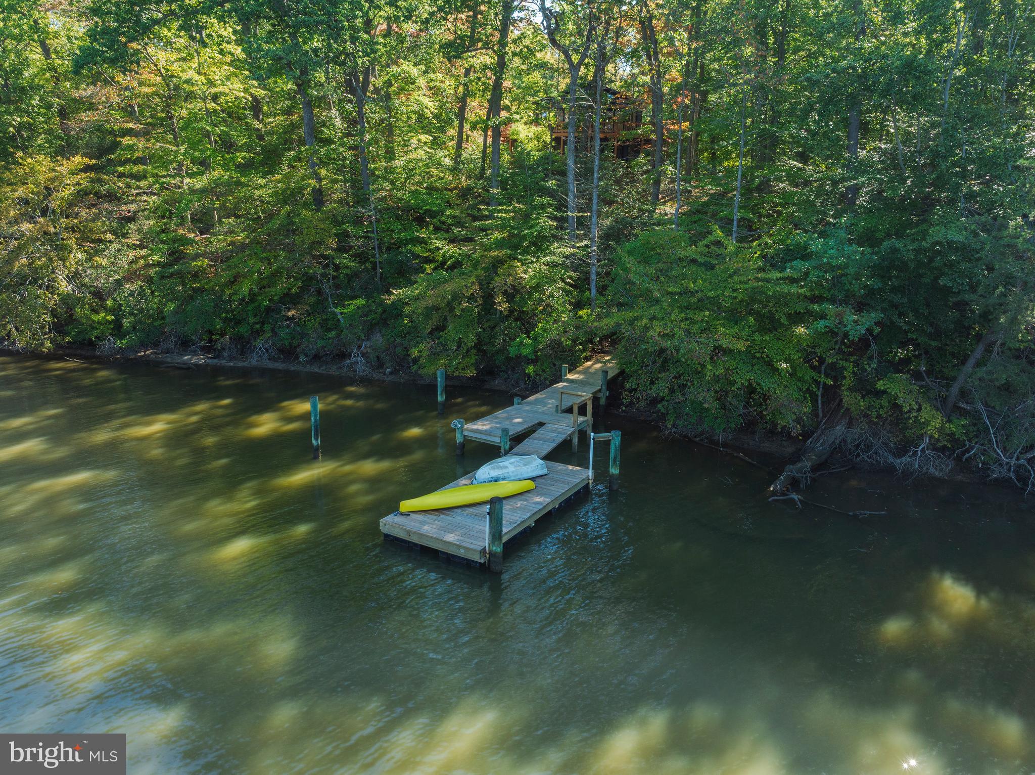 10050 Forrest Lane Chestertown, MD 21620 - Photo 4 of 49 a view of a swimming pool with a yard