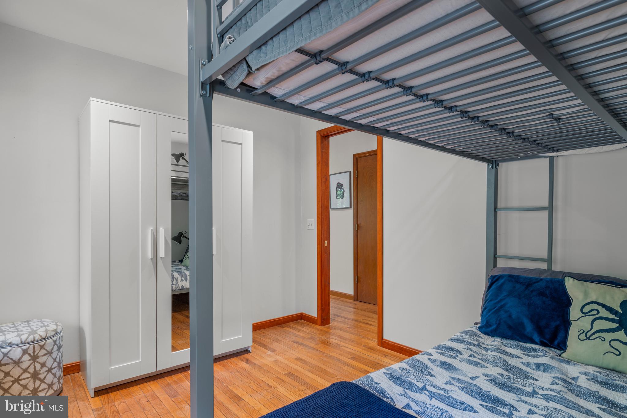 10050 Forrest Lane Chestertown, MD 21620 - Photo 43 of 49 a bedroom with a bed and wooden floor