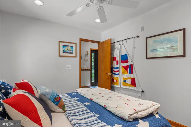 a bedroom with a bed and cabinets