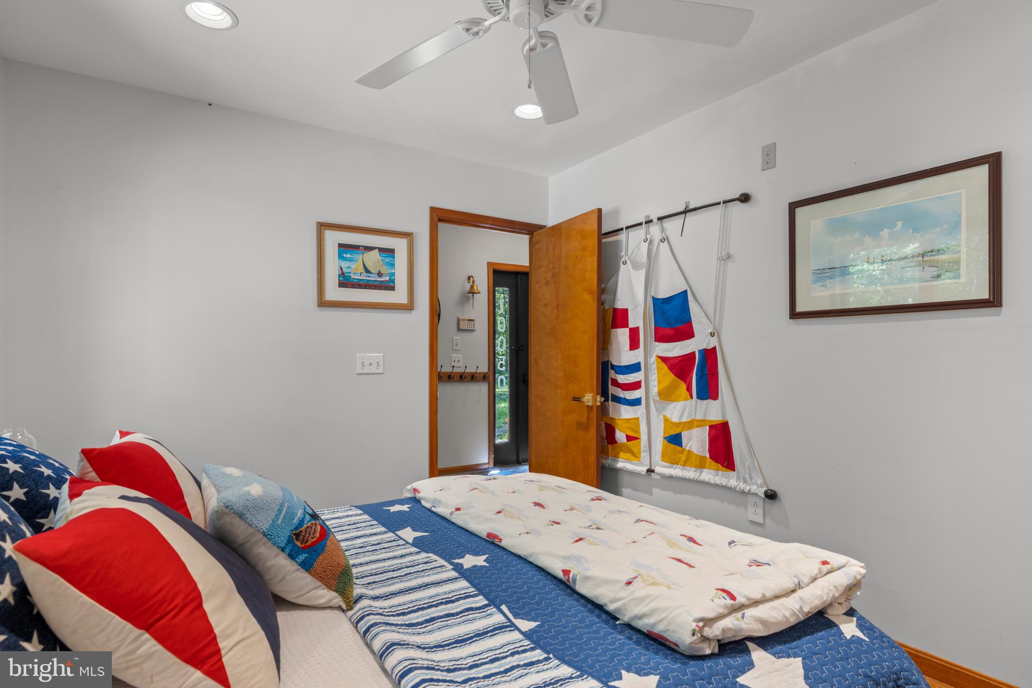 10050 Forrest Lane Chestertown, MD 21620 - Photo 46 of 49 a bedroom with a bed and cabinets