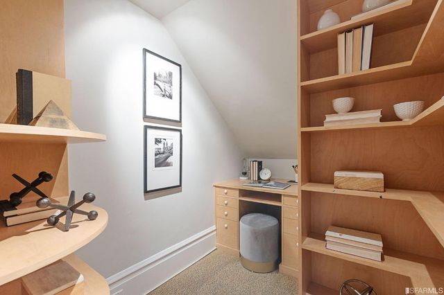 a view of a patio with couches table and chairs and potted plants