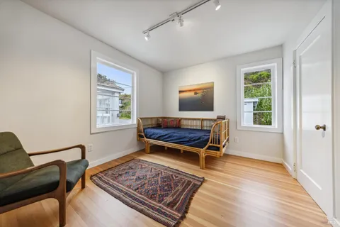 a living room with a couch and a window