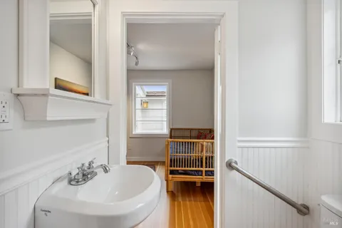 a bathroom with a bathtub and a sink