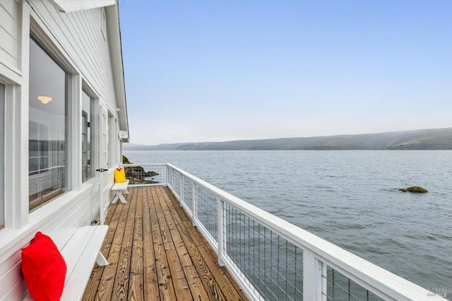 a view of balcony with seating space